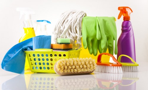 Carpet cleaning team preparing equipment safely
